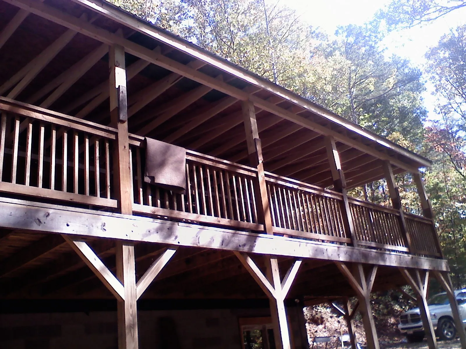 Timber framing under a new elevated porch and deck — Roof Leak Repair in Black Eagle by Roofing Brothers